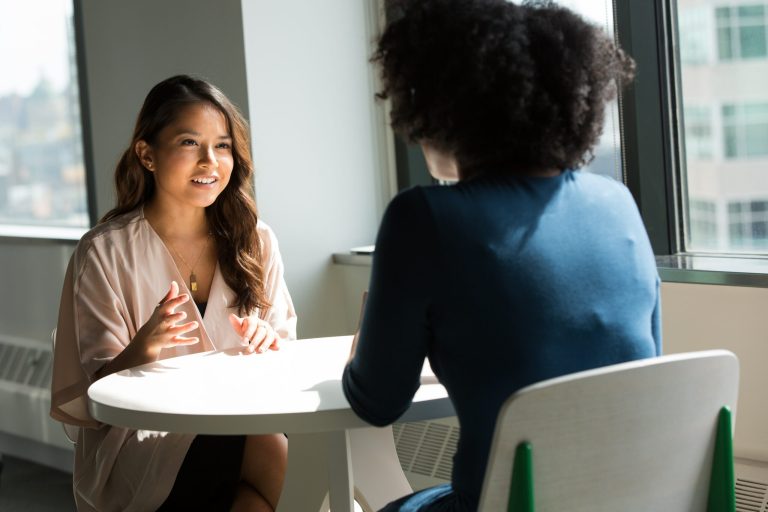 Two people using active listening skills, ubuntu principles